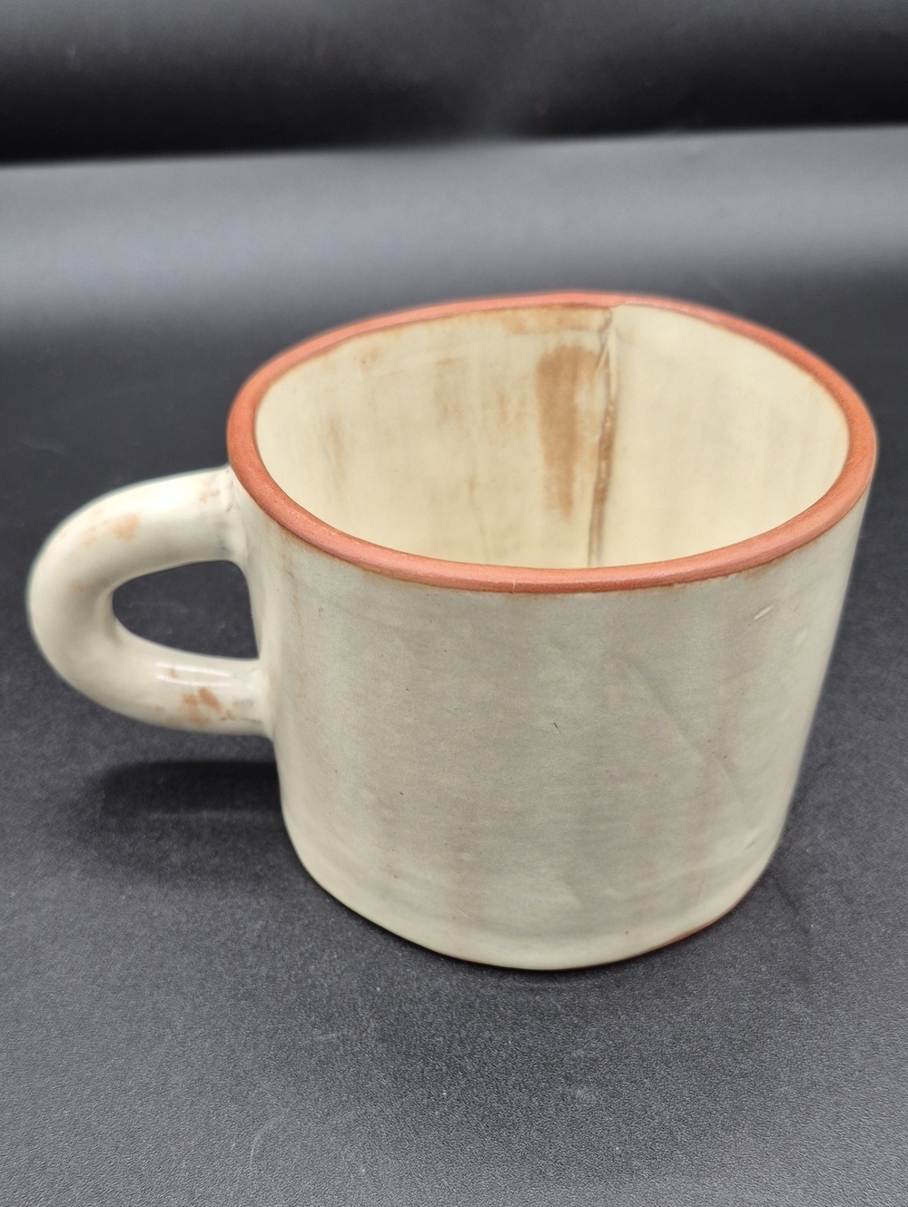 Handcrafted Cream Pottery Coffee Mug with Terracotta Rim